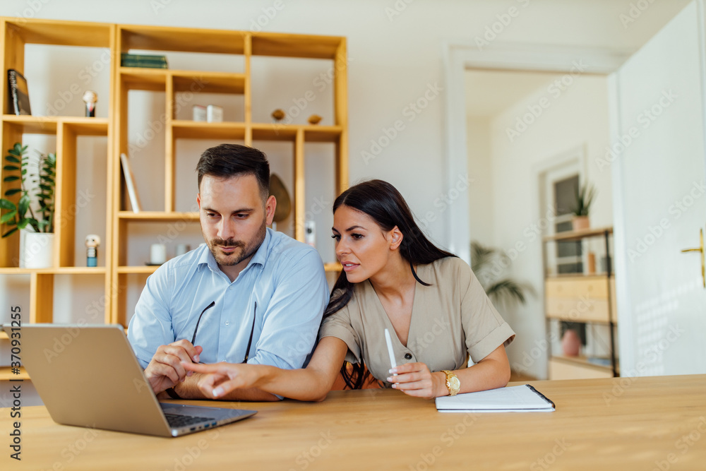 Successful business team at work. Group of young business people working. Successful business team at work. Group of young business people working.