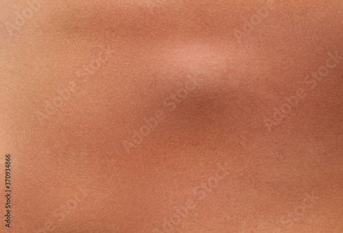 Textured copper, brass or bronze background.