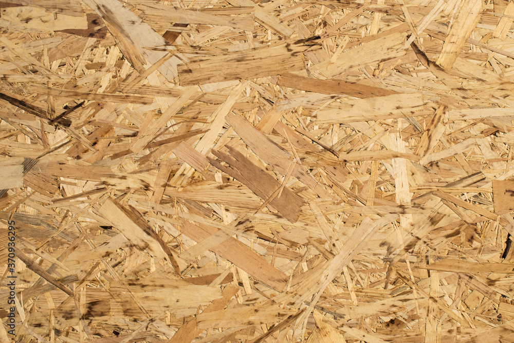 background consisting of a part of the chipboard close-up. Background, Wallpaper and banner for social networks background consisting of a part of the chipboard close-up. Background, Wallpaper and banner for social networks