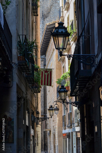 Narrow tiny street in Barcelona, Spain