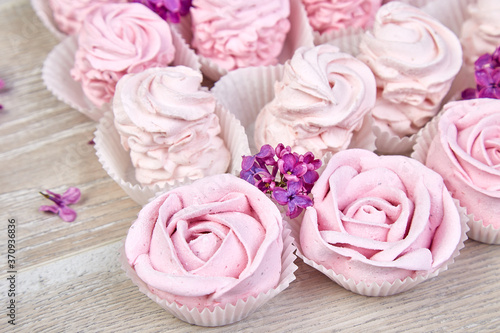 Wallpaper Mural Violet sweet homemade marshmallow from blackcurrant near lilac flowers Torontodigital.ca