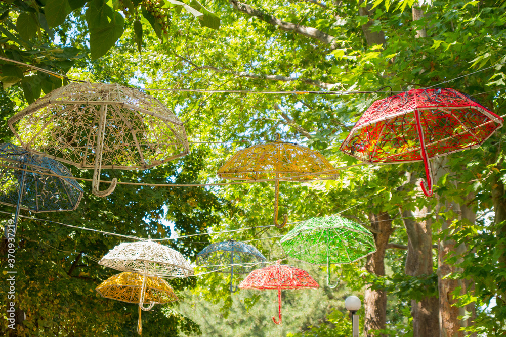 Multi-colored garlands in the form of umbrellas