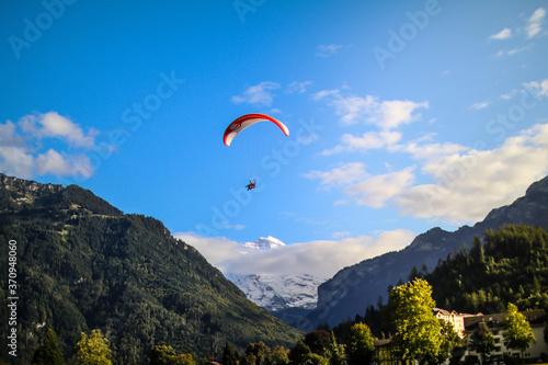 paraglider in the sky of switzerland