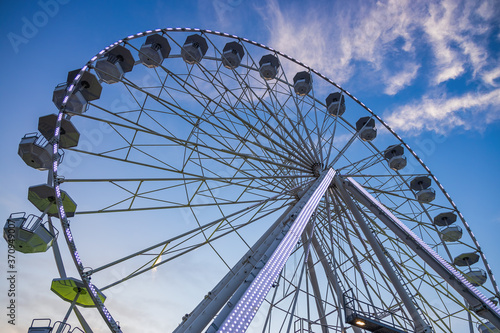 Ferris Wheel with Blue Sky and clouds