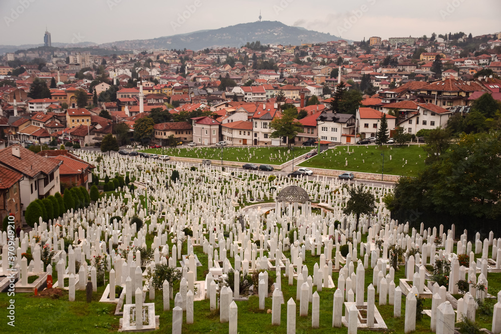 Sehidsko Mezarje Kovaci war cemetery with Sarajevo Old Town in the background