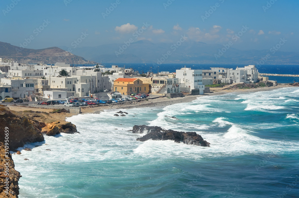 Waves in the harbor of Naxos island in Greece