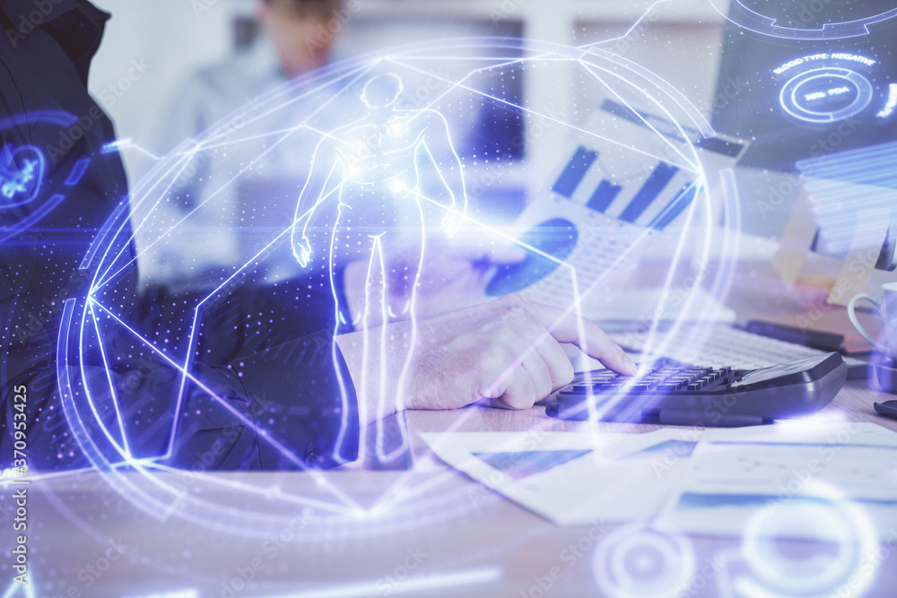 Science hologram with man working on computer on background. Concept of study. Double exposure. Science hologram with man working on computer on background. Concept of study. Double exposure.