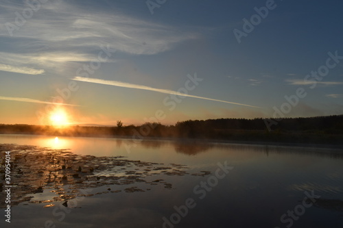 sunrise over the river lake