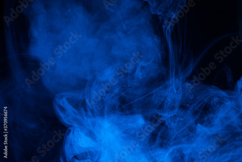 Blue steam on a black background.