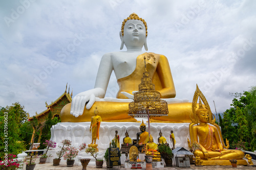 Big Buddha at  Wat Phra That Doi Kham, Chiang Mai, Thailand  © rbk365