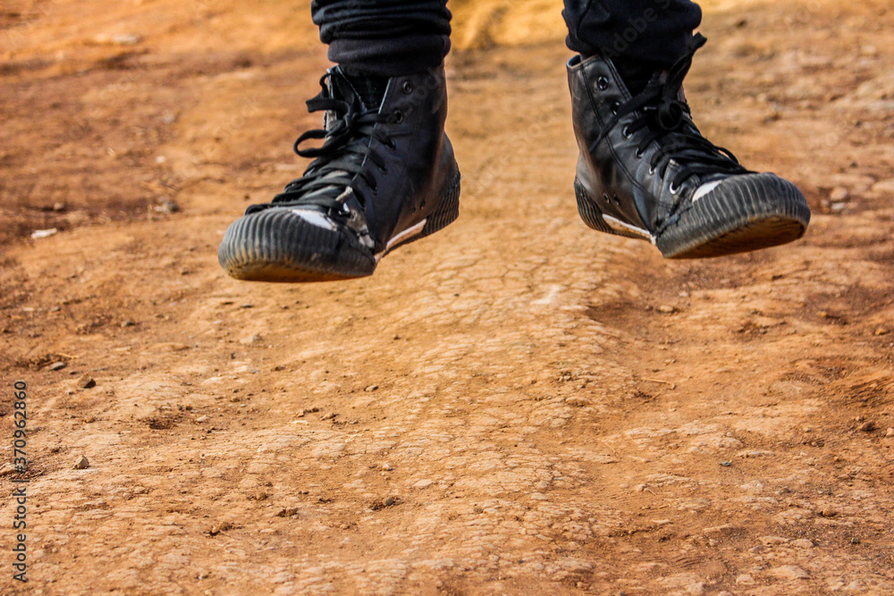 hiking boots on the ground hiking boots on the ground