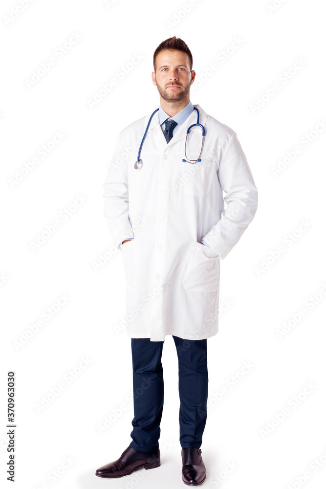 Confident male doctor portrait while standing at isolated white background