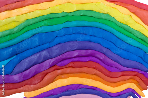Plasticine rainbow gradient background. Kids artwork texture.