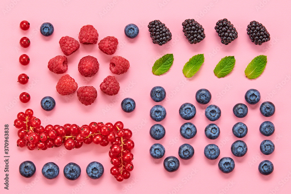 Blueberry, blackberry, raspberry, redcurrant layout. Fresh blueberry, berries mix on pink. Red raspberry, mint creative composition. Colorful minimal concept, top view. Blueberry, blackberry, raspberry, redcurrant layout. Fresh blueberry, berries mix on pink. Red raspberry, mint creative composition. Colorful minimal concept, top view.