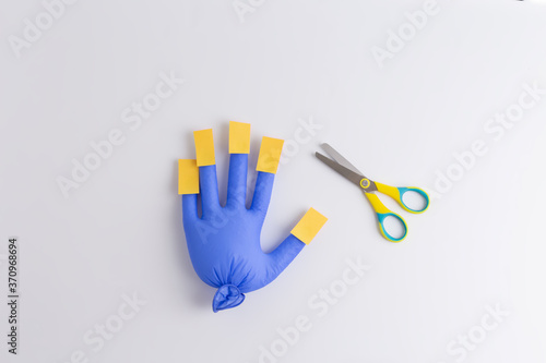 rubber hand with paper nails craft  scissors practice ideas  kids art project  DIY  top view 