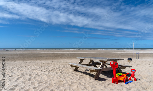 Kijkduin Beach on a sunny day in June with beach toys #2