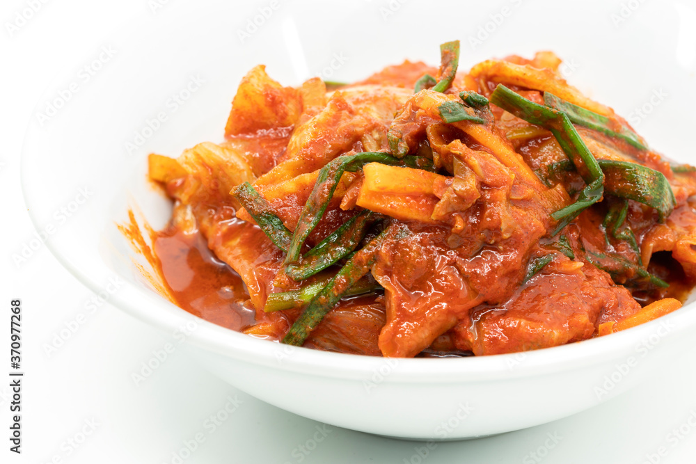 Korea Kimchi, close up homemade kimchi in white bowl on white background. Healthy food of Asia. Korea Kimchi, close up homemade kimchi in white bowl on white background. Healthy food of Asia.