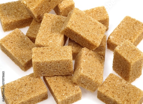 Brown Cube Sugar against White Background