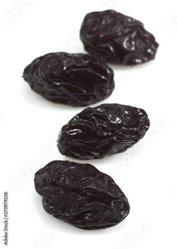Dry Prunes against White Background