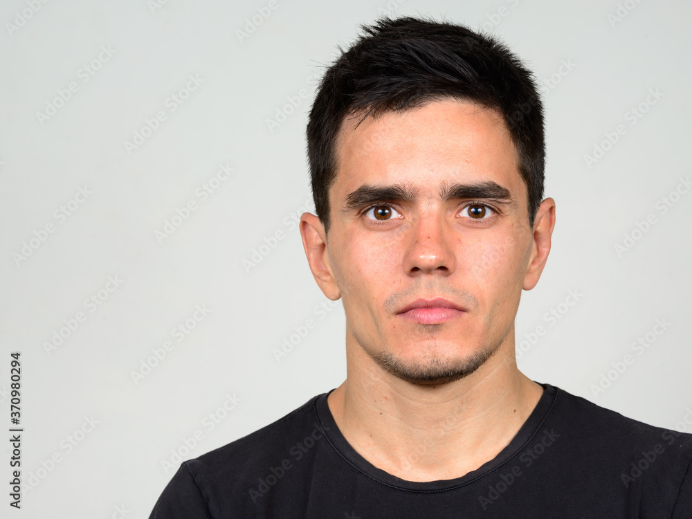 Portrait of handsome man against white background Portrait of handsome man against white background