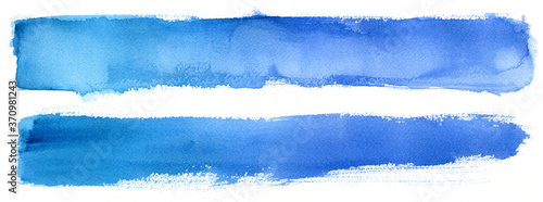 Фотография long watercolor stain. Hand painted watercolor stroke on paper.