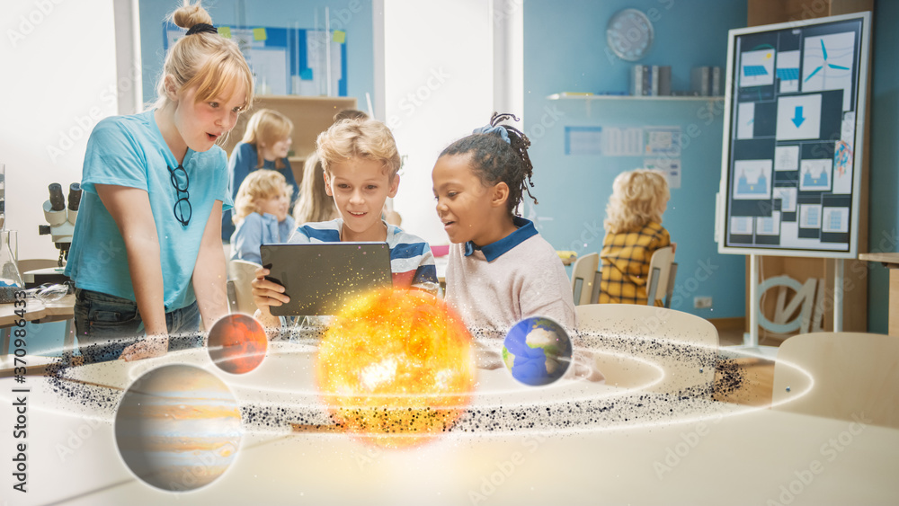 Three Diverse School Children in Science Class Use Digital Tablet Computer  with Augmented Reality Software, Looking at Educational 3D Animation Of  Solar System. VFX, Special Effects Render Stock Photo | Adobe Stock