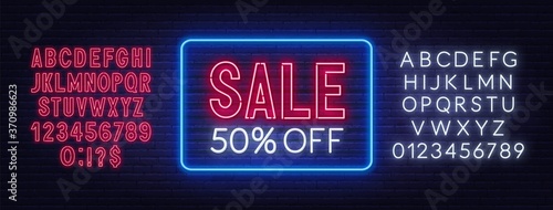 Sale 50 percent off neon sign on brick wall background. Discount template.
