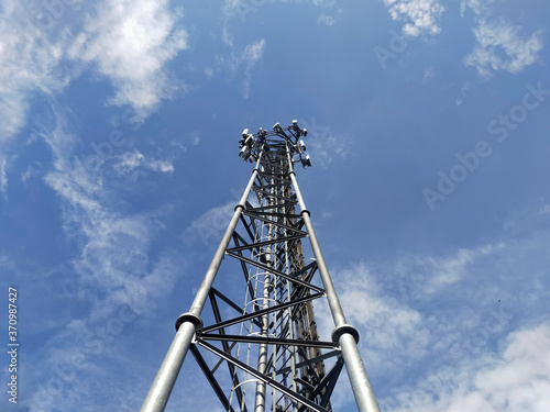 Signal towers with sky in background.