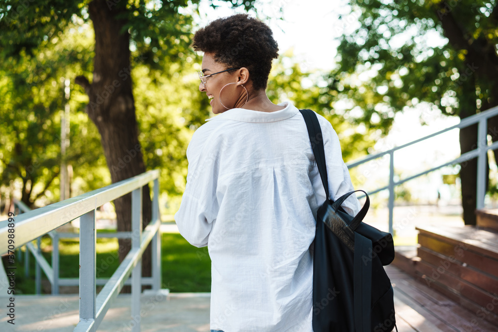 Attractive young african young student girl walking Attractive young african young student girl walking