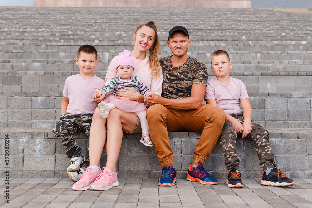 Fototapeta premium beautiful young family of five