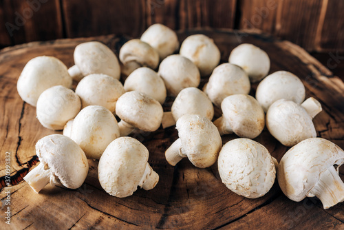 Mushrooms on a wooden background close up