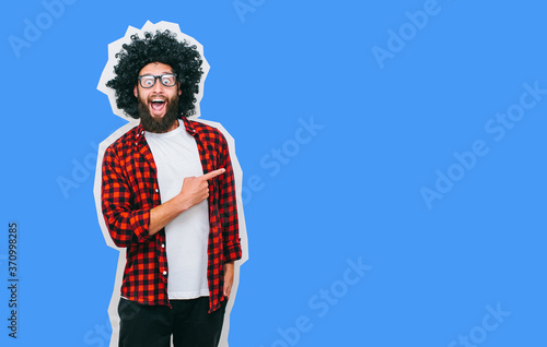 Hipster man pointing with fingers at your text. Crazy hipster guy emotions. Discount, sale, season sales.