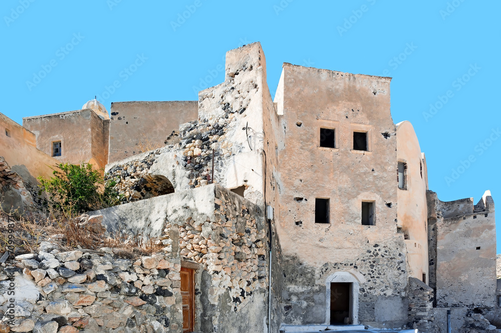Ancient distorted castle at village Emporio in Santorini island, Greece