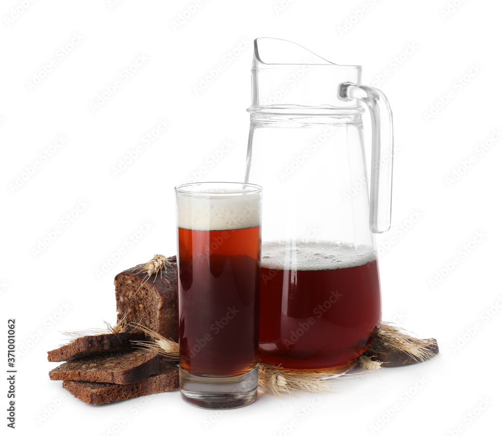 Delicious kvass, bread and spikes on white background Delicious kvass, bread and spikes on white background