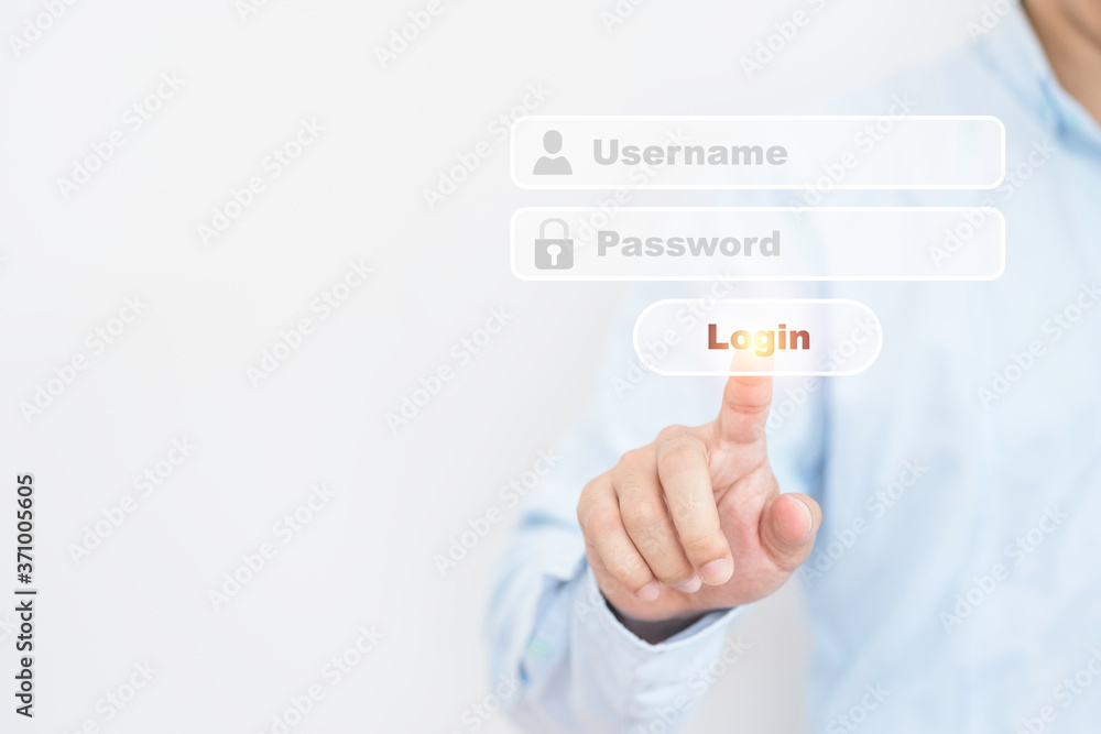Businessman touching virtual username and password to login computer system and smartphone. Businessman touching virtual username and password to login computer system and smartphone.