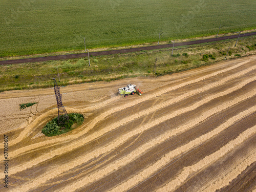 Aerial drone view. Harvested Ukrainian wheat field.