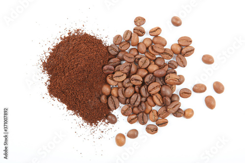 coffee beans and freshly ground coffee isolated on white 
