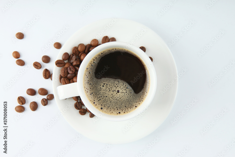 coffee beans and coffee cup on colored background with place for text
coffee beans and coffee cup on colored background with place for text
