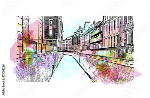 Building view with landmark of Amiens is a city in northern France, divided by the Somme river. Watercolor splash with hand drawn sketch illustration in vector.