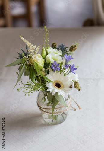 bouquet of flowers in a vase © Евгения Смульская