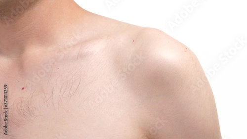 Wallpaper Mural Closeup on the shoulder area of a young man. Human body part over a white screen background. Torontodigital.ca