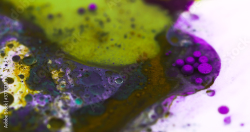 Closeup Paint with Vibrant Color Palette. Oil Mixed with Bright Green and Purple Dye and Paint.