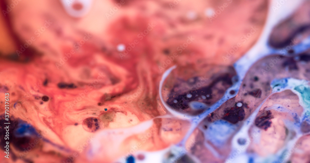 Fototapeta premium Macro Paint with Vibrant Color Palette. Oil Mixed with Bright Pink and Purple Dye and Paint.
