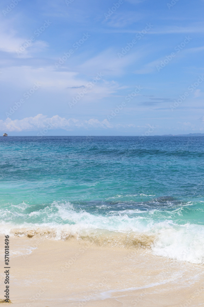 Suwehan beach on Nusa Penida Island, Bali, Indonesia. Amazing view, white sand beach with rocky mountains and azure lagoon with clear water of Indian Ocean Suwehan beach on Nusa Penida Island, Bali, Indonesia. Amazing view, white sand beach with rocky mountains and azure lagoon with clear water of Indian Ocean