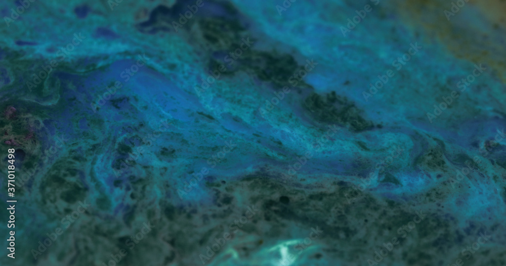 Obraz premium Macro Paint with Vibrant Color Palette. Oil Mixed with Deep Blue Dye and Paint.