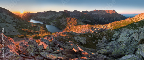 Sunset in High Tatras mountains national park in Slovakia. Scenic image of mountains. The sunrise over Carpathian mountains. Wonderful landscape. Picturesque view of nature. Amazing natural Background