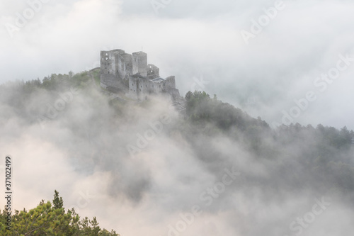 Cornstein Medieval castle in South Moravia region during amazing sunrise  Czech republic  Europe. Aerial drone view. Summer or autumn time. Misty and sunny atmosphere.