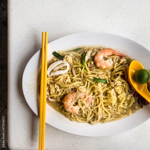 Photography Flat lay food photography: Authentic Singapore Hokkien prawn mee served in a local food court