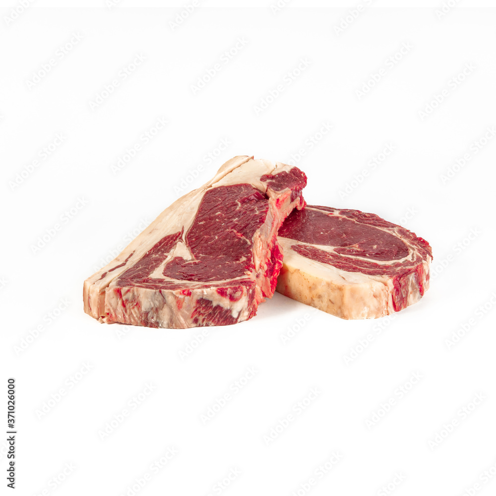 Matured beef chops, two fillets , photograph taken on pure white background, for e-commerce. front view Matured beef chops, two fillets , photograph taken on pure white background, for e-commerce. front view