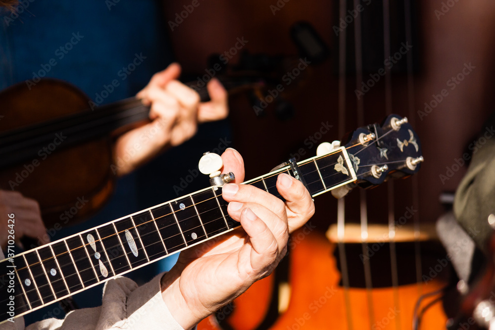 Fototapeta premium Banjo fret board being played